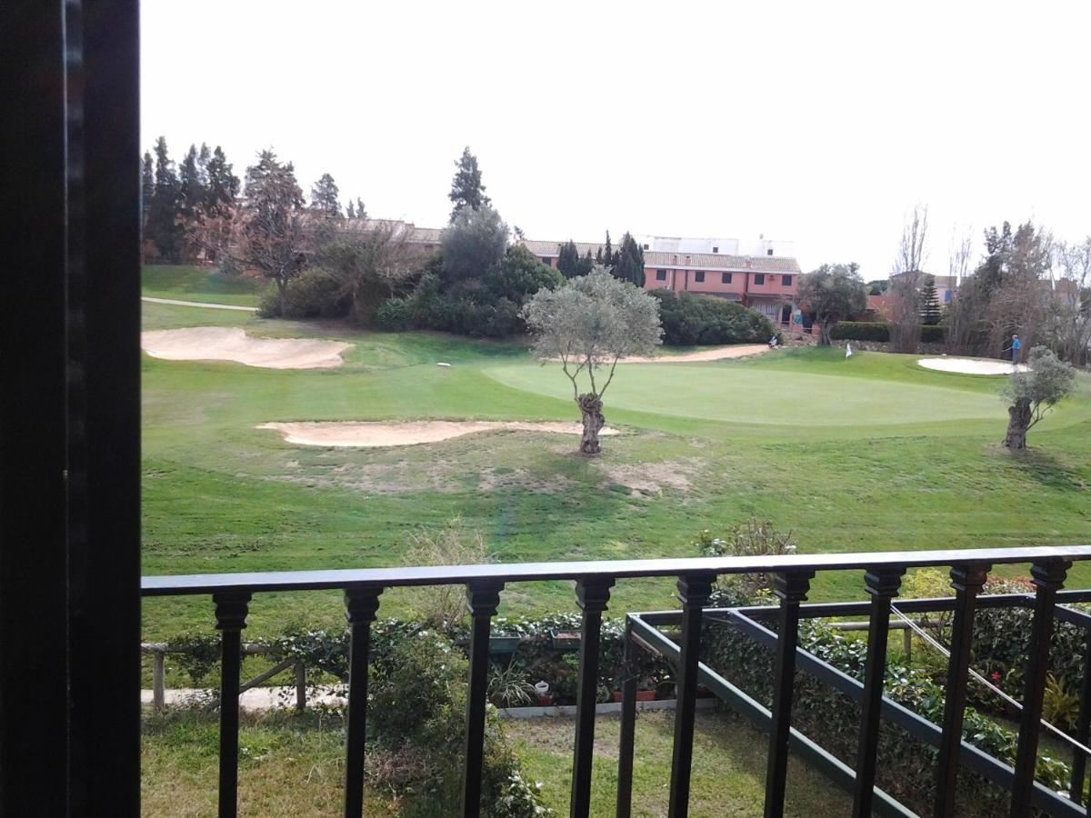 Olhando Um Campo De Golf Islantilla Buitenkant foto