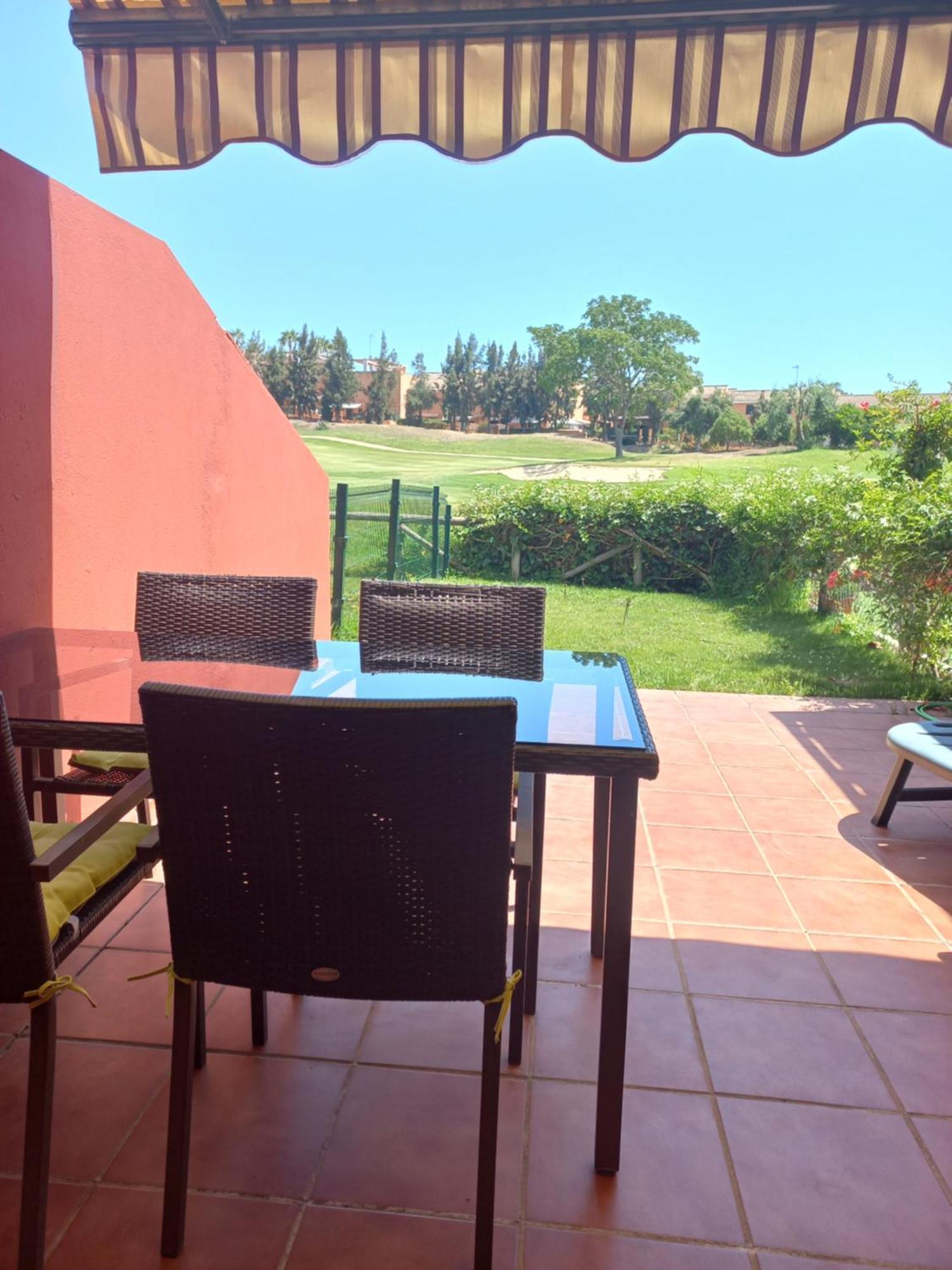 Olhando Um Campo De Golf Islantilla Buitenkant foto